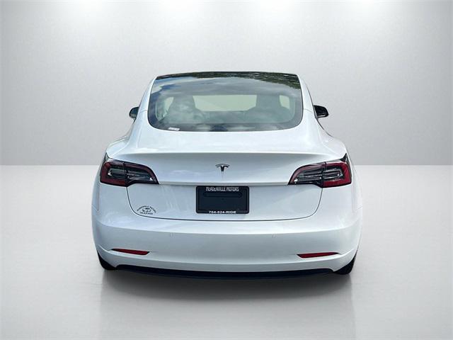 Photo of 2021 Pearl White Multi-Coat Tesla Model 3