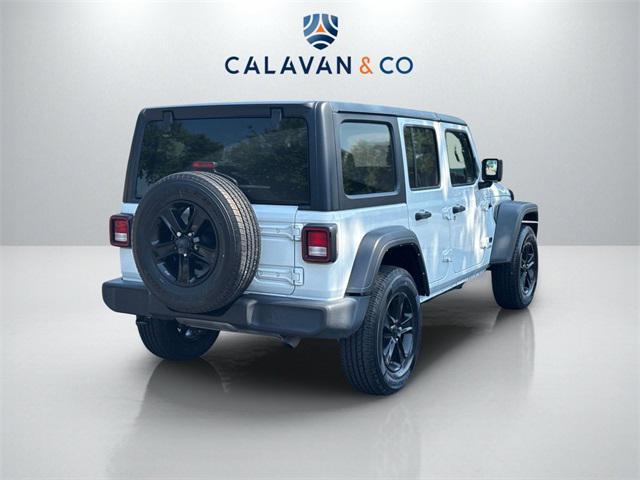 Photo of 2021 Bright White Clearcoat Jeep Wrangler Unlimited
