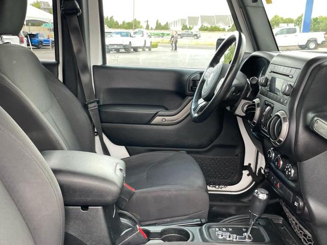 Photo of 2018 Bright White Clearcoat Jeep Wrangler JK Unlimited