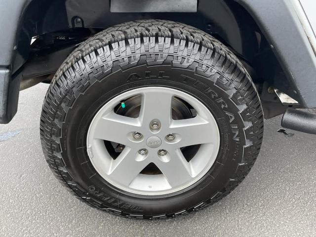 Photo of 2018 Bright White Clearcoat Jeep Wrangler JK Unlimited