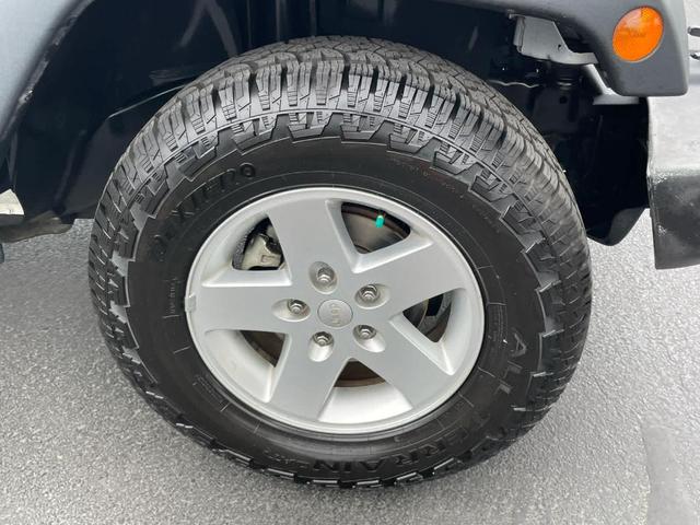 Photo of 2018 Bright White Clearcoat Jeep Wrangler JK Unlimited