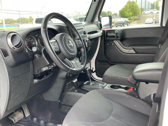 Photo of 2018 Bright White Clearcoat Jeep Wrangler JK Unlimited