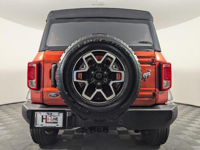 Photo of 2022 HOT PEPPER RED MET TINT CC Ford Bronco