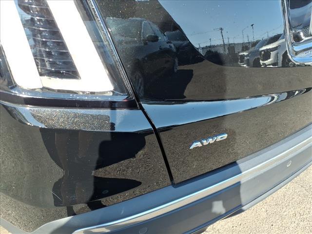 Photo of 2022 Stellar Black Metallic Cadillac XT5