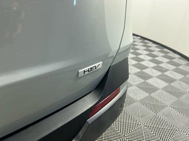 Photo of 2025 Ivory Silver Kia Carnival Hybrid