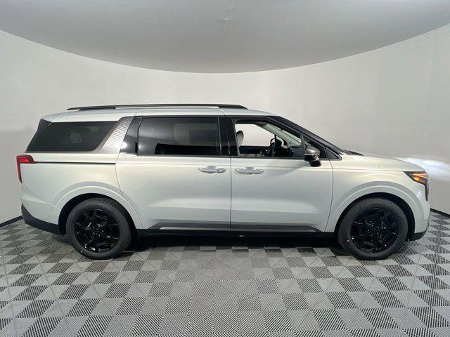 Photo of 2025 Ivory Silver Kia Carnival Hybrid