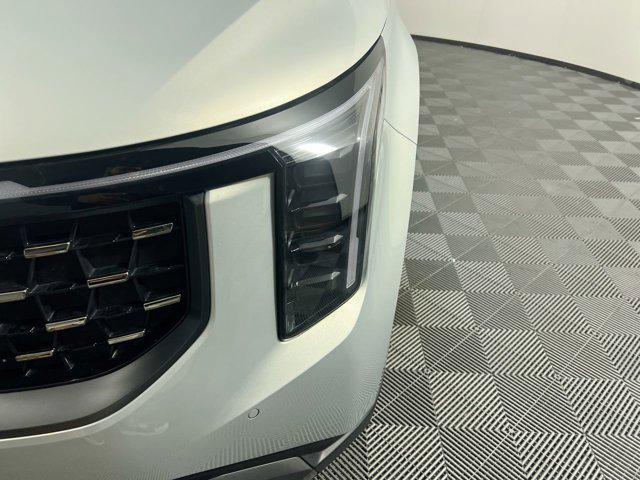Photo of 2025 Ivory Silver Kia Carnival Hybrid