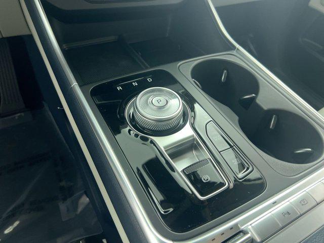 Photo of 2025 Ivory Silver Kia Carnival Hybrid