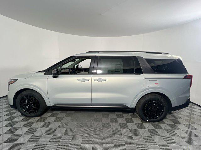 Photo of 2025 Ivory Silver Kia Carnival Hybrid