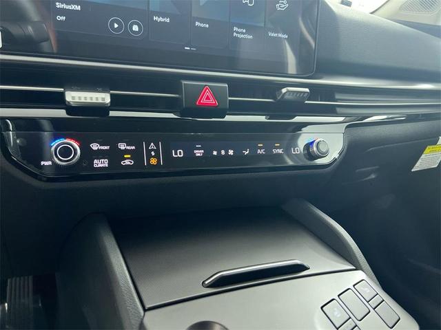 Photo of 2026 Wolf Gray Kia Sportage Hybrid