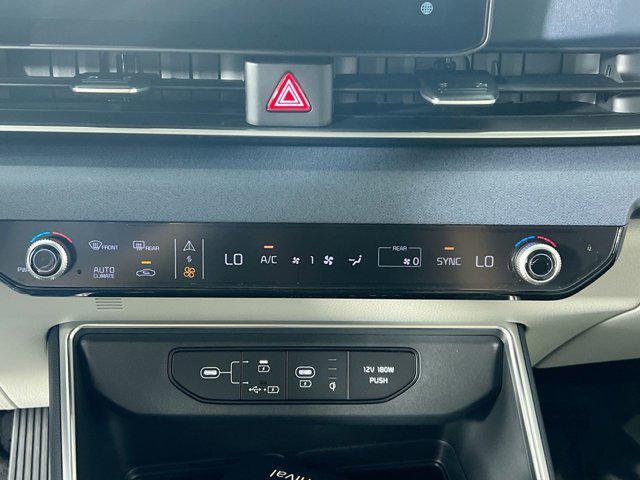 Photo of 2026 Snow White Pearl Kia Carnival Hybrid