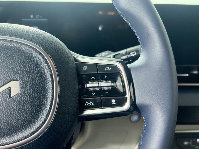 Photo of 2026 Snow White Pearl Kia Carnival Hybrid