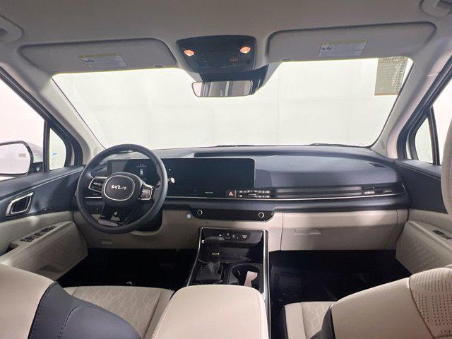Photo of 2026 Snow White Pearl Kia Carnival Hybrid