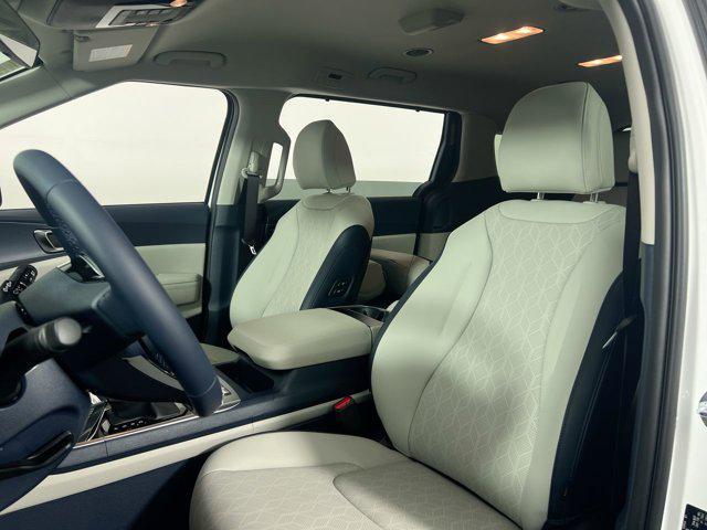 Photo of 2026 Snow White Pearl Kia Carnival Hybrid