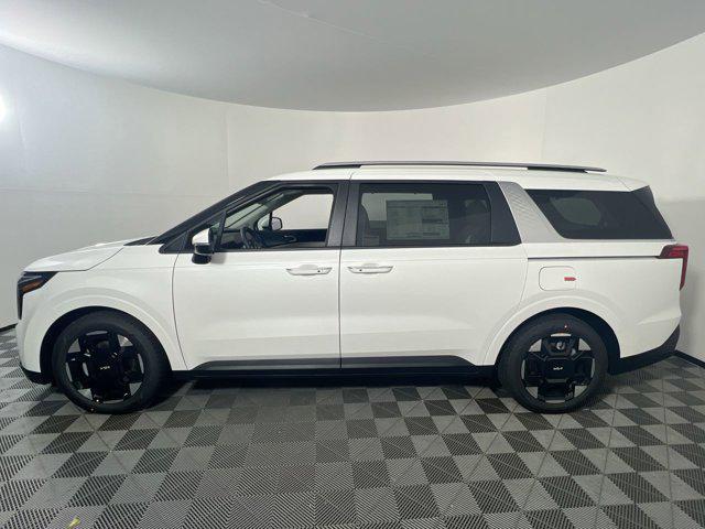 Photo of 2026 Snow White Pearl Kia Carnival Hybrid