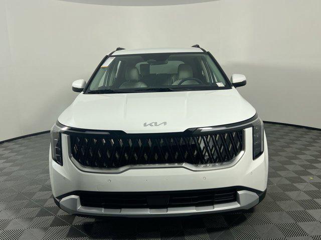 Photo of 2026 Snow White Pearl Kia Carnival Hybrid