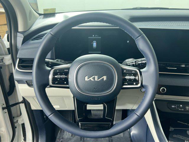 Photo of 2026 Snow White Pearl Kia Carnival Hybrid
