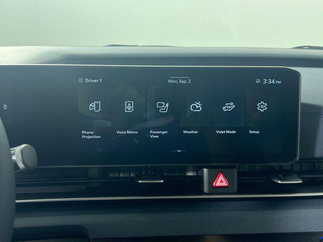 Photo of 2026 Snow White Pearl Kia Carnival Hybrid