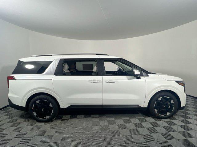 Photo of 2026 Snow White Pearl Kia Carnival Hybrid