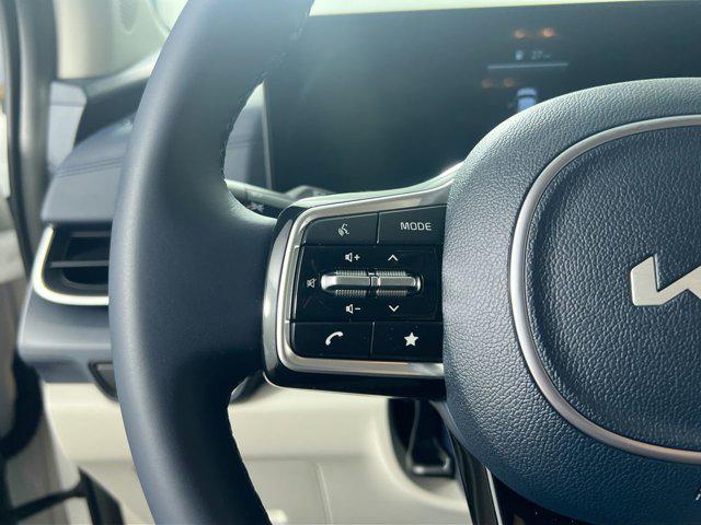 Photo of 2026 Snow White Pearl Kia Carnival Hybrid