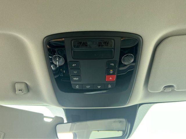 Photo of 2026 Snow White Pearl Kia Carnival Hybrid