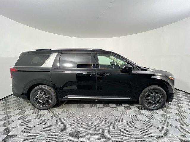 Photo of 2026 Aurora Black Pearl Kia Carnival