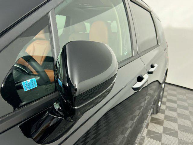 Photo of 2026 Aurora Black Pearl Kia Carnival