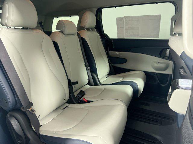 Photo of 2026 Snow White Pearl Kia Carnival Hybrid