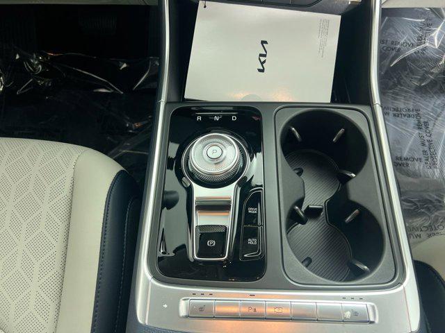 Photo of 2026 Snow White Pearl Kia Carnival Hybrid