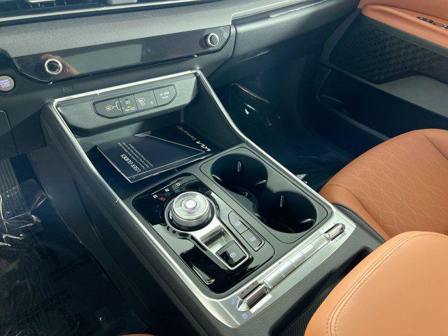 Photo of 2026 Aurora Black Pearl Kia Carnival Hybrid