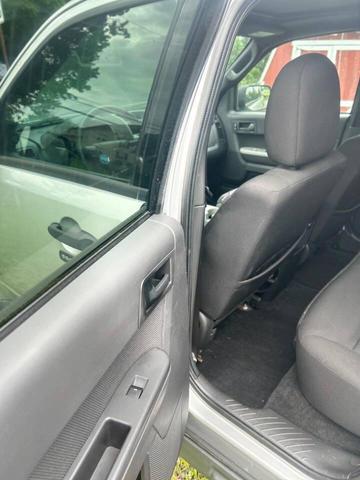 Photo of 2010 Ingot Silver Metallic Ford Escape
