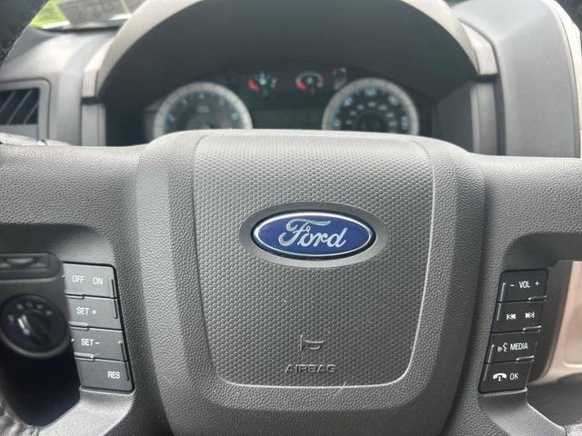 Photo of 2010 Ingot Silver Metallic Ford Escape