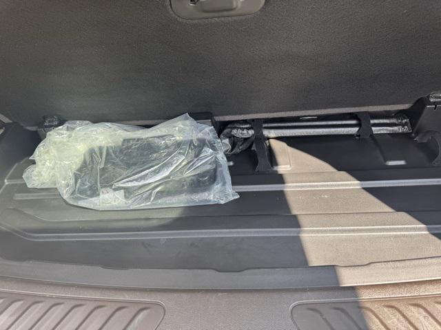 Photo of 2024 Pearl Beige Metallic GMC Yukon