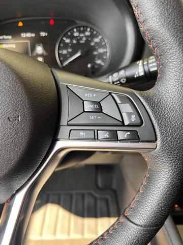 Photo of 2023 Scarlet Ember Tintcoat/Super Black Nissan Kicks
