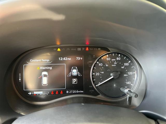 Photo of 2023 Scarlet Ember Tintcoat/Super Black Nissan Kicks
