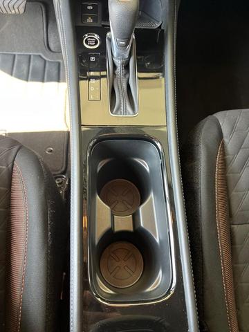 Photo of 2023 Scarlet Ember Tintcoat/Super Black Nissan Kicks