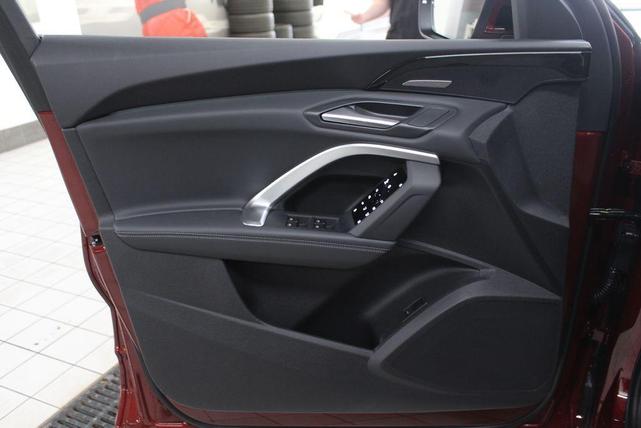 Photo of 2025 Grenadier Red Metallic Audi Q5