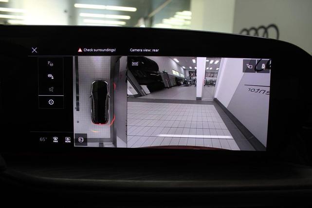Photo of 2025 Grenadier Red Metallic Audi Q5