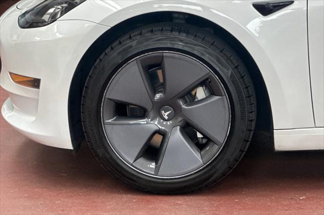 Photo of 2023 Pearl White Multi-Coat Tesla Model 3