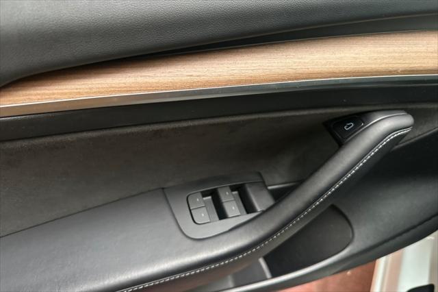 Photo of 2023 Pearl White Multi-Coat Tesla Model 3