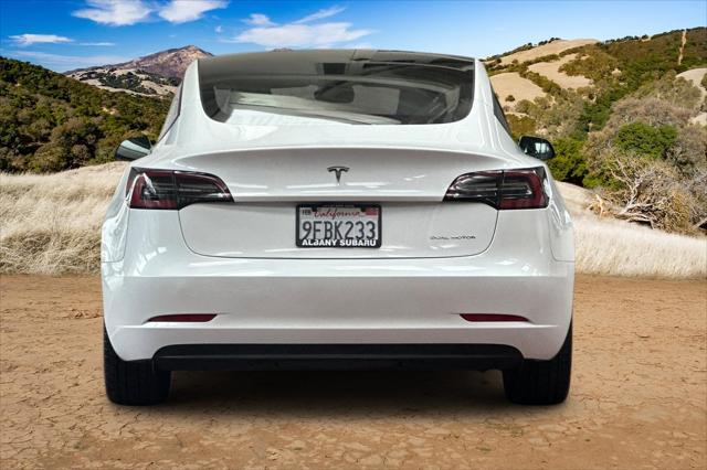 Photo of 2023 Pearl White Multi-Coat Tesla Model 3