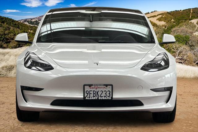 Photo of 2023 Pearl White Multi-Coat Tesla Model 3