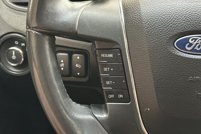 Photo of 2011 Ingot Silver Metallic Ford Taurus