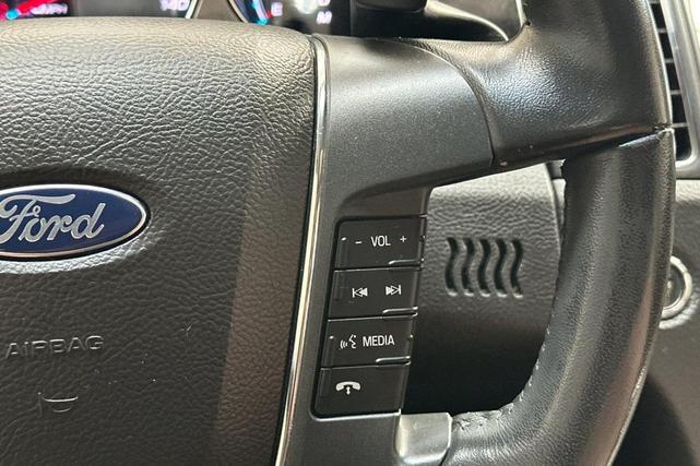 Photo of 2011 Ingot Silver Metallic Ford Taurus
