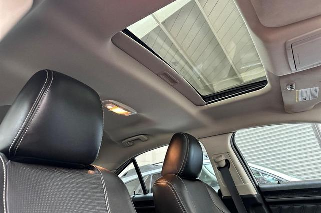 Photo of 2011 Ingot Silver Metallic Ford Taurus