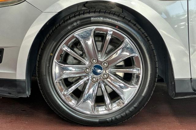 Photo of 2011 Ingot Silver Metallic Ford Taurus