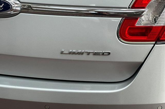Photo of 2011 Ingot Silver Metallic Ford Taurus