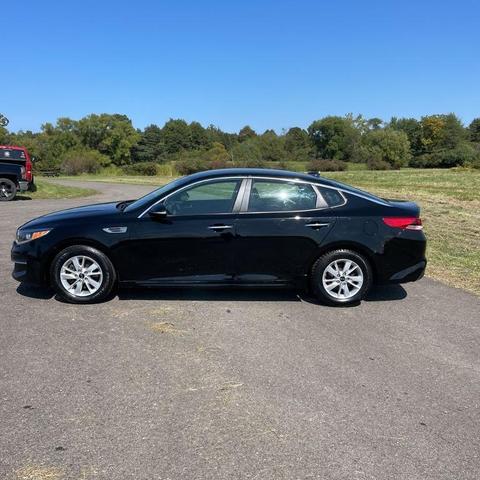 Photo of 2018 Ebony Black Kia Optima