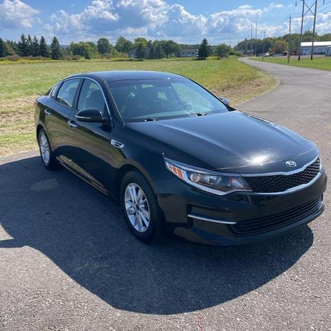 Photo of 2018 Ebony Black Kia Optima