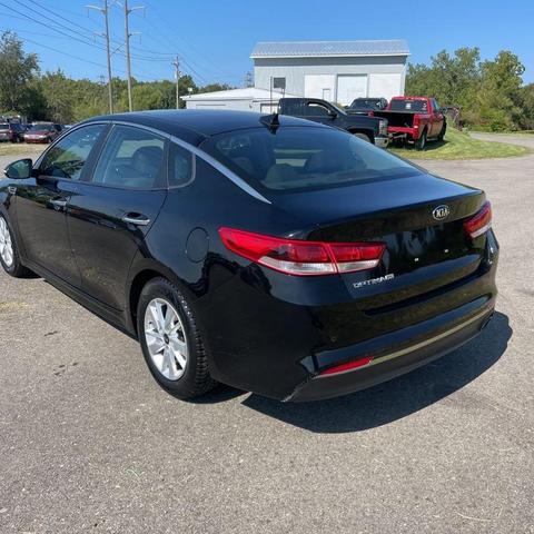 Photo of 2018 Ebony Black Kia Optima